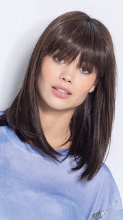 Model is wearing DARK CHOCOLATE ROOTED | Darkest/Dark Brown with Dark Auburn Blend and Shaded Roots