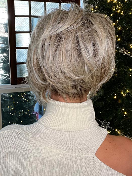 Jenna Fail in BOUDOIR GLAM by RAQUEL WELCH in color RL19/23SS SHADED BISCUIT | Light Ash Blonde Evenly Blended with Cool Platinum Blonde with Dark Roots