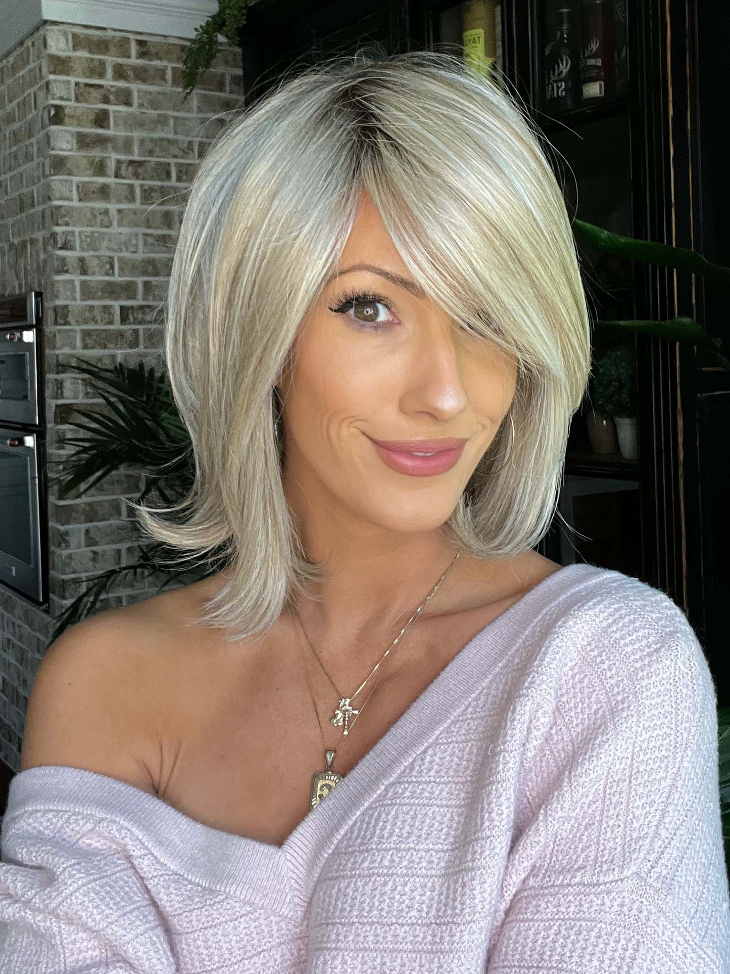 UPSTAGE by RAQUEL WELCH WIGS in color RL19/23SS SHADED BISCUIT | Light Ash Blonde Evenly Blended with Cool Platinum Blonde with Dark Roots