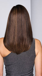 Model is wearing ROME ROMANCE by RAQUEL WELCH in color RH4/10SS SHADED JAVA | Off Black with Dark Brown highlights from dark roots to ends