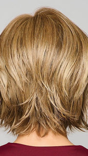 Model is wearing MAIN CHARACTER by RAQUEL WELCH in RL 13/88 GOLDEN PECAN | Neutral Medium Blonde With Pale Honey Blonde Highlight