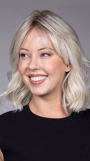 Model is wearing ATHEN by BELLETRESS in color ALPINE CREAM R | Icy Blonde Shade with a Cool, Creamy Base Softened by Hints of Pale Beige