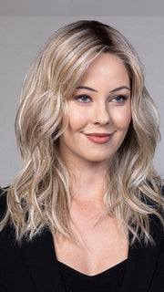 Model is wearing CAMPBELL by BELLETRESS in color BUTTERBEER R | Dark Brown Base and Root that transitions smoothly into a buttery blonde, infused with creamy honey and toffee tones