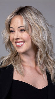 Model is wearing CAMPBELL by BELLETRESS in color BUTTERBEER R | Dark Brown Base and Root that transitions smoothly into a buttery blonde, infused with creamy honey and toffee tones