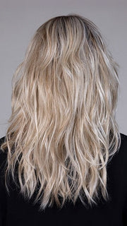 Model is wearing CAMPBELL by BELLETRESS in color BUTTERBEER R | Dark Brown Base and Root that transitions smoothly into a buttery blonde, infused with creamy honey and toffee tones