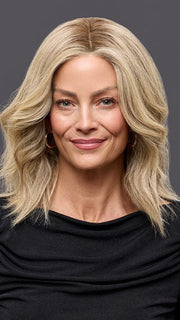 Model is wearing CARRIE LARGE by JON RENAU in color 24BT18S8 SHADED MOCHA | Medium Natural Ash Blonde & Light Natural Gold Blonde Blend, Shaded with Medium Brown
