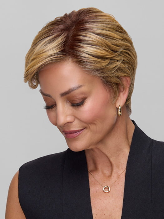 Model is wearing CELINE by JON RENAU in color 24BT18S8 SHADED MOCHA | Medium Natural Ash Blonde & Light Natural Gold Blonde Blend, Shaded with Medium Brown