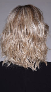 Model is wearing DONNA by BELLETRESS in color BUTTERBEER R | Dark Brown Base and Root that transitions smoothly into a buttery blonde, infused with creamy honey and toffee tones