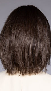 Model is wearing DUBLIN by BELLETRESS in color COOLEST ASH BROWN R | A combination of Light Ash Brown, Cool Medium Brown and a hint of Dark Blonde and Dark Roots