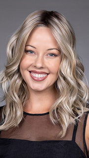 Model is wearing EVERDEEN by BELLETRESS in color BUTTERBEER R | Dark Brown Base and Root that transitions smoothly into a buttery blonde, infused with creamy honey and toffee tones