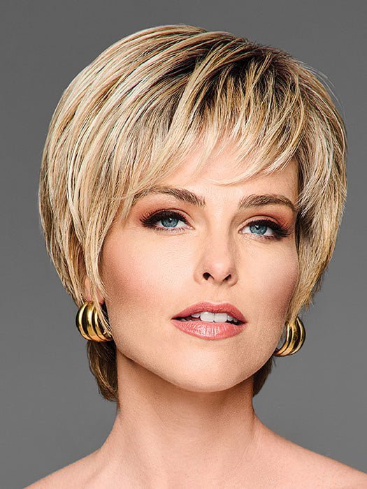 Model is wearing DEMURE DO by Gabor in GF14-88SS GOLDEN WHEAT | Dark Blonde evenly Blended with Pale Blonde Highlights and Dark Roots