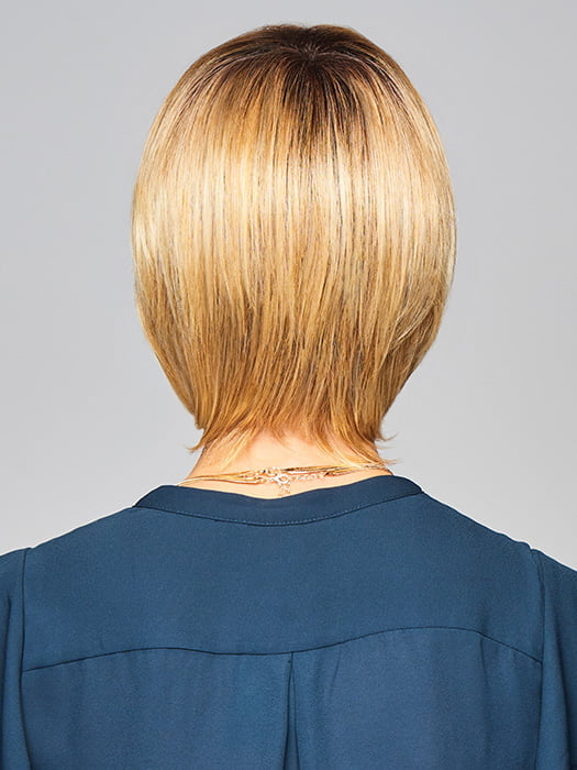 Model is wearing ENLIGHTEN by GABOR in color SS-MEDIUM-BLONDE | Medium Blonde with Warm Highlights & Dark Brown Roots