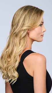 Model is wearing 18" VOLUME EXTENSION by HAIRDO in color SS14/88H SHADED GOLDEN WHEAT | Dark Blonde Evenly Blended with Pale Blonde Highlights and Dark Roots