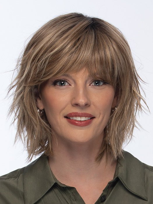 Model is wearing HOLLIS by ESTETICA in color RH12/26RT4 | Light Brown with Chunky Golden Blonde Highlights & Dark Brown Roots