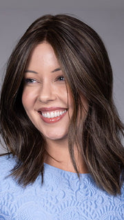 Model is wearing LYON by BELLETRESS in color DARK BROWN HL | A Blend of Dark Brown, Strawberry Light Auburn and Soft Chunky Medium and Dark Blonde Highlights
