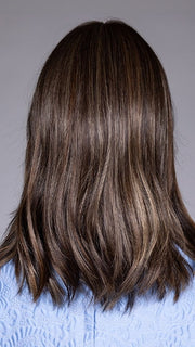 Model is wearing LYON by BELLETRESS in color DARK BROWN HL | A Blend of Dark Brown, Strawberry Light Auburn and Soft Chunky Medium and Dark Blonde Highlights