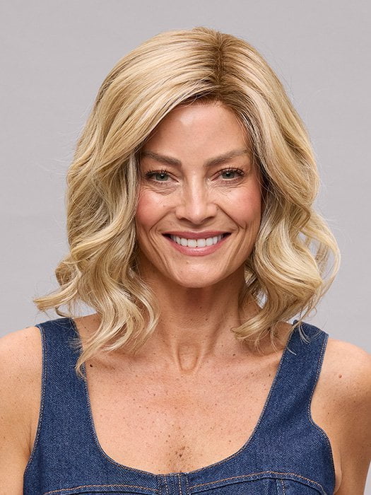 Model is wearing LACY LITE by JON RENAU in color 12FS12 MALIBU BLONDE | Light Gold Brown, Light Natural Gold Blonde, Pale Natural Gold-Blonde Blend, Shaded with Light Gold Brown