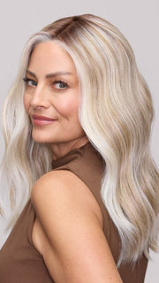 Model is wearing MORGAN by JON RENAU in color 101/88/27S8 CATALINA BLONDE | Pale blonde with Pure White Natural Violet halo highlights, shaded medium brown
