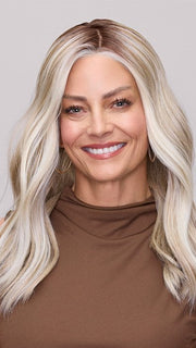 Model is wearing MORGAN by JON RENAU in color 101/88/27S8 CATALINA BLONDE | Pale blonde with Pure White Natural Violet halo highlights, shaded medium brown