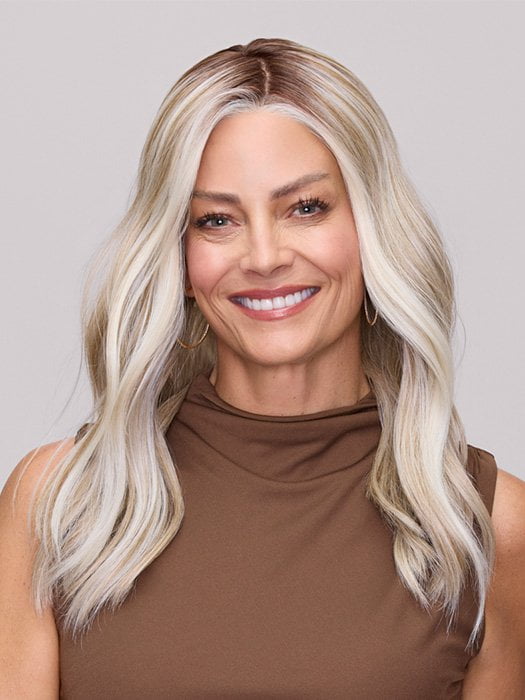Model is wearing MORGAN by JON RENAU in color 101/88/27S8 CATALINA BLONDE | Pale blonde with Pure White Natural Violet halo highlights, shaded medium brown