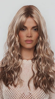 Model is wearing PHILLIPA by RENE OF PARIS in color WINTER OAT LATTE R | rooted honey blonde and platinum blonde blend with soft, dimensional highlights and lowlights