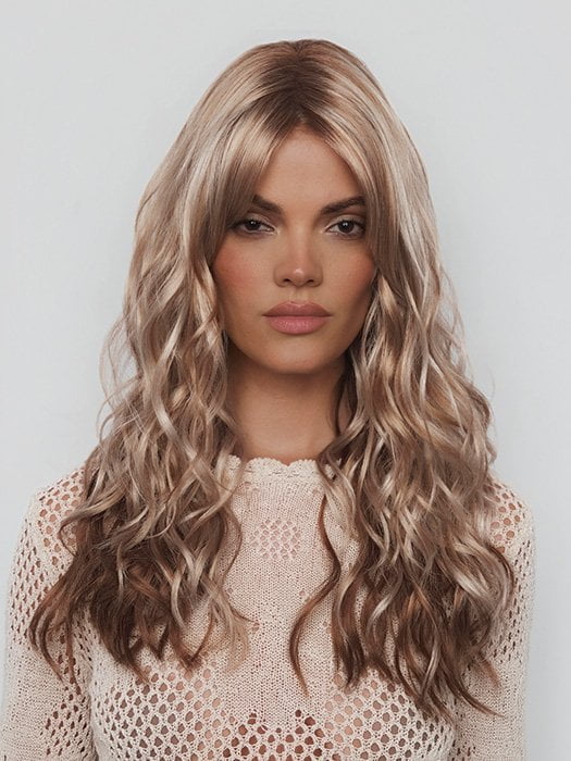 Model is wearing PHILLIPA by RENE OF PARIS in color WINTER OAT LATTE R | rooted honey blonde and platinum blonde blend with soft, dimensional highlights and lowlights