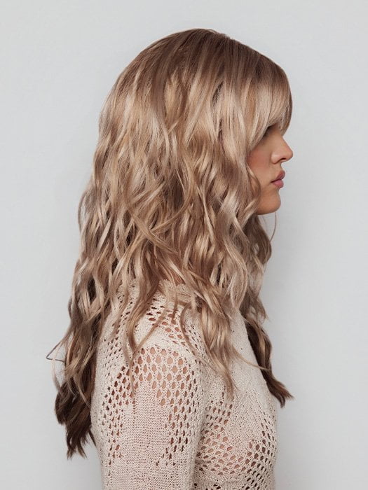 Model is wearing PHILLIPA by RENE OF PARIS in color WINTER OAT LATTE R | rooted honey blonde and platinum blonde blend with soft, dimensional highlights and lowlights