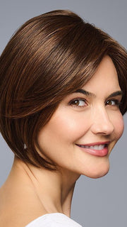 Model is wearing Top Billing 8" by Raquel Welch in RL6/30 COPPER MAHOGANY