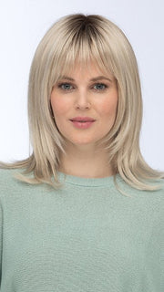 Model is wearing ROMA by ESTETICA in color SUNLIT-BLONDE | Soft Blend of Sandy Blonde, Lightest Blonde & Iced Blonde with a Light Golden Brown Roots