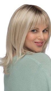Model is wearing ROMA by ESTETICA in color SUNLIT-BLONDE | Soft Blend of Sandy Blonde, Lightest Blonde & Iced Blonde with a Light Golden Brown Roots