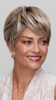 Model is wearing TESS by JON RENAU in color FS17/101S18 PALM SPRINGS BLONDE | Light Ash Blonde with Pure White Natural Violet Bold Highlights, Shaded with Dark Natural Ash Blonde