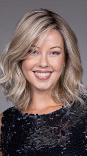 Model is wearing VIVIENNE by BELLETRESS in color BUTTERBEER R | Dark Brown Base and Root that transitions smoothly into a buttery blonde, infused with creamy honey and toffee tones
