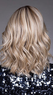 Model is wearing VIVIENNE by BELLETRESS in color BUTTERBEER R | Dark Brown Base and Root that transitions smoothly into a buttery blonde, infused with creamy honey and toffee tones