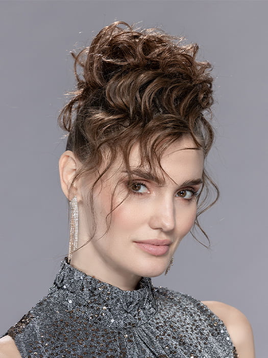Model is wearing ICE by ELLEN WILLE in color CHOCOLATE-MIX | Medium Brown Blended with Light Auburn, and Dark Brown Blend