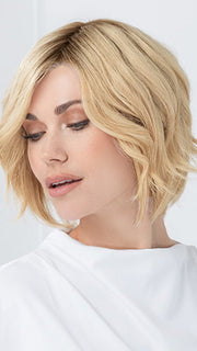 Model is wearing JADORE DELUXE by ELLEN WILLE in color LIGHT CHAMPAGNE ROOTED | Lightest Pale Blonde and Lightest Golden Blonde with Winter White Blend and Shaded Roots