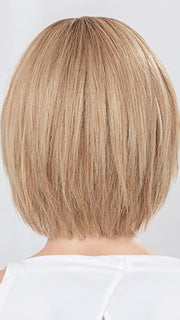 Model is wearing JADORE DELUXE in color LIGHT CHAMPAGNE ROOTED | Lightest Pale Blonde and Lightest Golden Blonde with Winter White Blend and Shaded Roots
