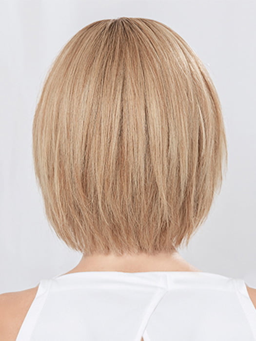 Model is wearing JADORE DELUXE in color LIGHT CHAMPAGNE ROOTED | Lightest Pale Blonde and Lightest Golden Blonde with Winter White Blend and Shaded Roots