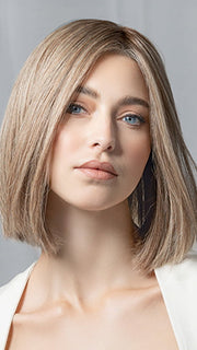 Model is wearing Supreme Plus Deluxe by Ellen Wille in color SAND MULTI ROOTED 15.22.14 | Light Ash Blonde and Light Neutral Blonde with Medium Ash Blonde Blend and Shaded Roots