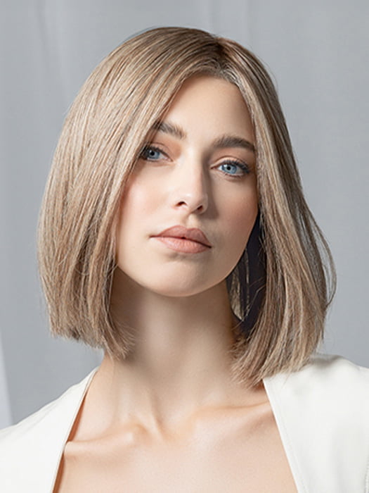 Model is wearing Supreme Plus Deluxe by Ellen Wille in color SAND MULTI ROOTED 15.22.14 | Light Ash Blonde and Light Neutral Blonde with Medium Ash Blonde Blend and Shaded Roots