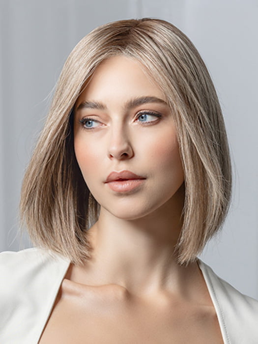 Model is wearing Supreme Plus Deluxe by Ellen Wille in color SAND MULTI ROOTED 15.22.14 | Light Ash Blonde and Light Neutral Blonde with Medium Ash Blonde Blend and Shaded Roots