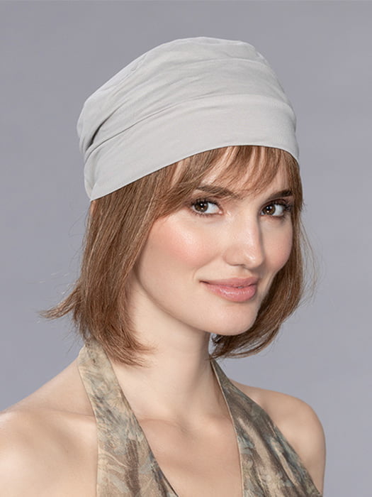 Model is wearing VERBENA by ELLEN WILLE in color MOCCA MIX 830.10 | Medium Brown Blended with Light Auburn and Light Brown Blend