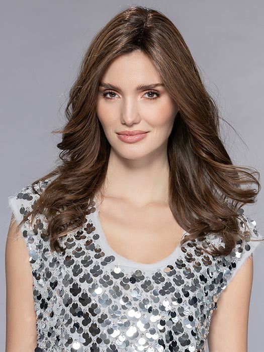 Model is wearing ANISE by ELLEN WILLE in CHOCOLATE ROOTED 830.27.6 | Medium to Dark Brown base with Light Reddish Brown highlights and Dark Roots