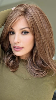 Roxie wearing CURVE APPEAL by RAQUEL WELCH in RL30/27 RUSTY AUBURN | Medium Auburn Evenly Blended with Strawberry Blonde