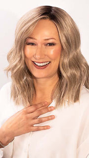 Tanya is wearing BIG SPENDER by RAQUEL WELCH in color RL17/23SS ICED LATTE MACCHIATO | Honey Blonde shaded with Cool Blonde