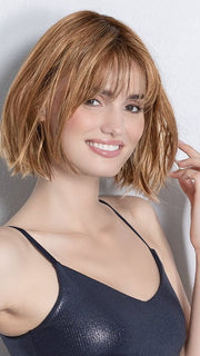 Model is wearing DARK SAND FROSTED | Lightest Brown and Medium Warm Brown with Grey Blend and a Soft Matte Finish