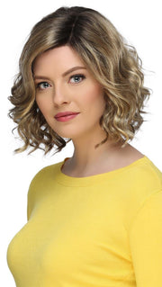 Layers of gorgeous tight curls give Wren a look that's absolutely breathtaking