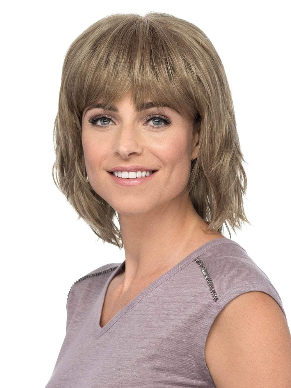 Hunter is a fresh, fun bob with full bangs and texturized tousled locks