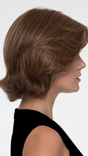Face-framing layers and flipped out ends add a touch of whimsy to any wardrobe