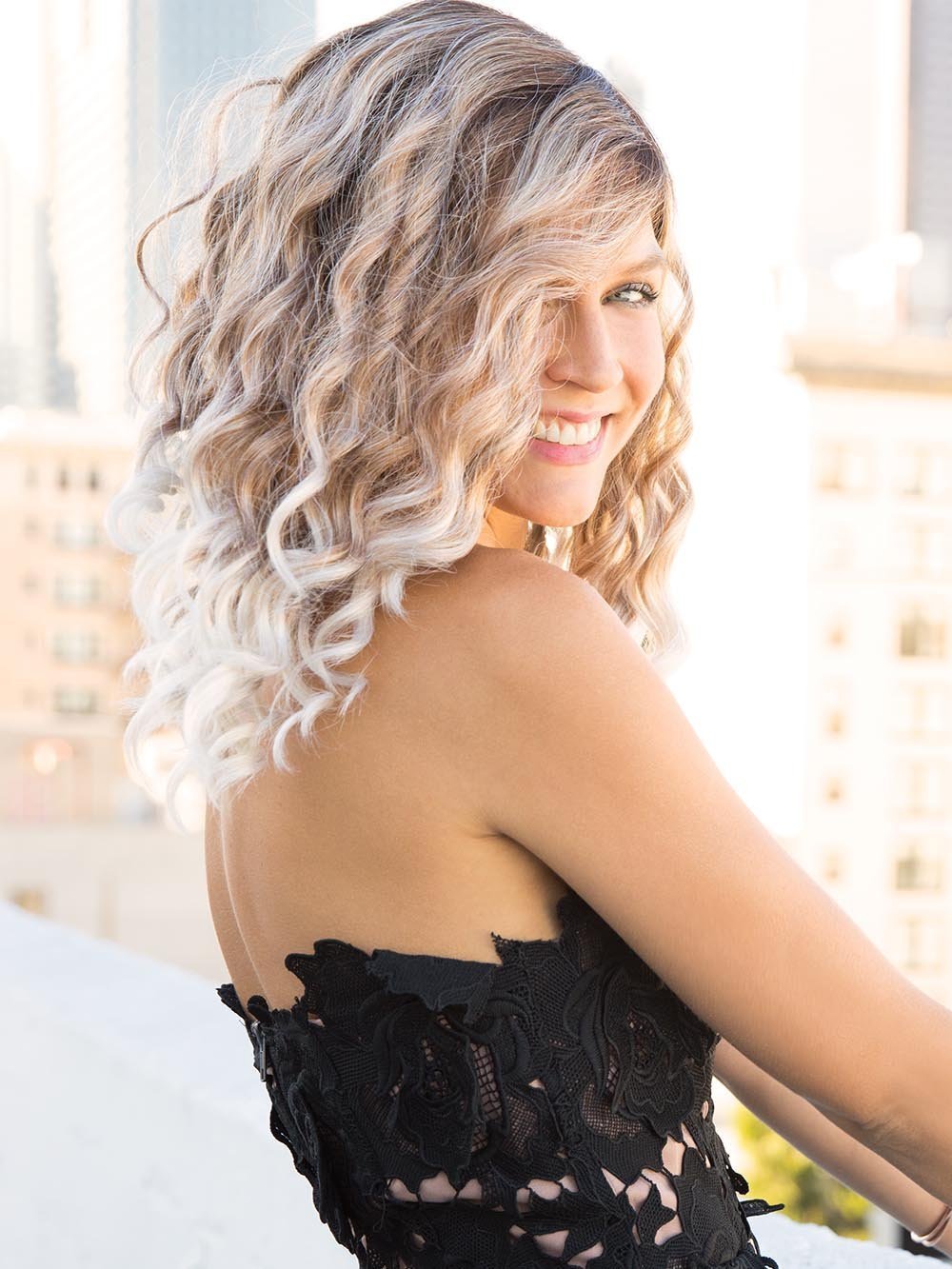 A youthful fun style that features long, playful spiral curls
