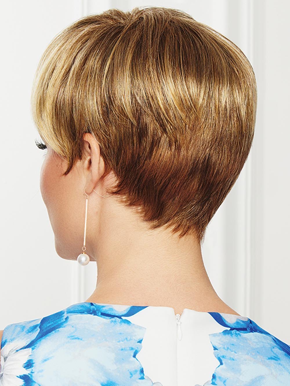 While the shorter sides and nape area present a polished, refined edge